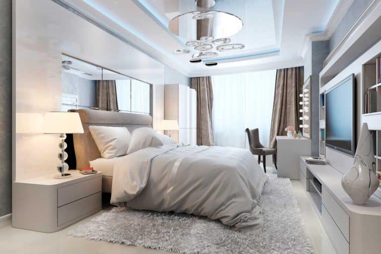 A cozy white and silver bedroom interior with chandelier, White and Silver Bedroom Decor Ideas