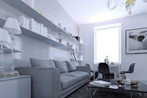 White and silver themed living room with cozy gray sofa and standing lamp on side table, 37 White and Silver Living Room Ideas That Will Inspire You