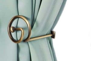 Read more about the article 13 Types Of Curtain Hooks And Tiebacks [Including Examples]