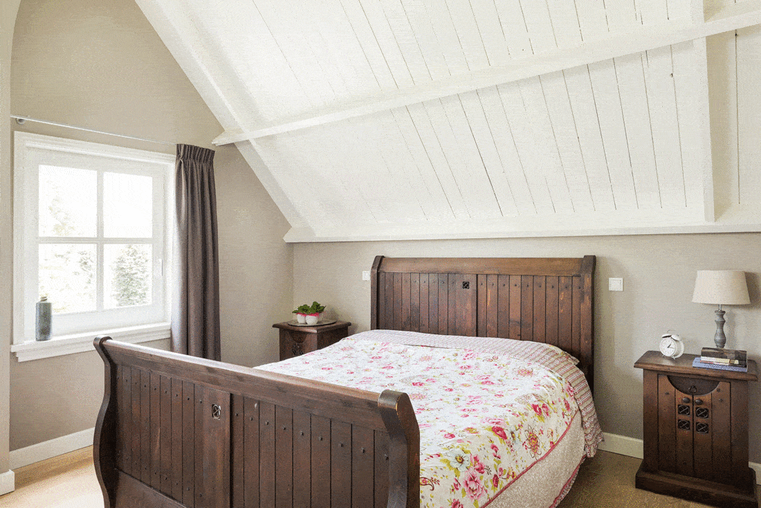 Attic bedroom with wooden interior