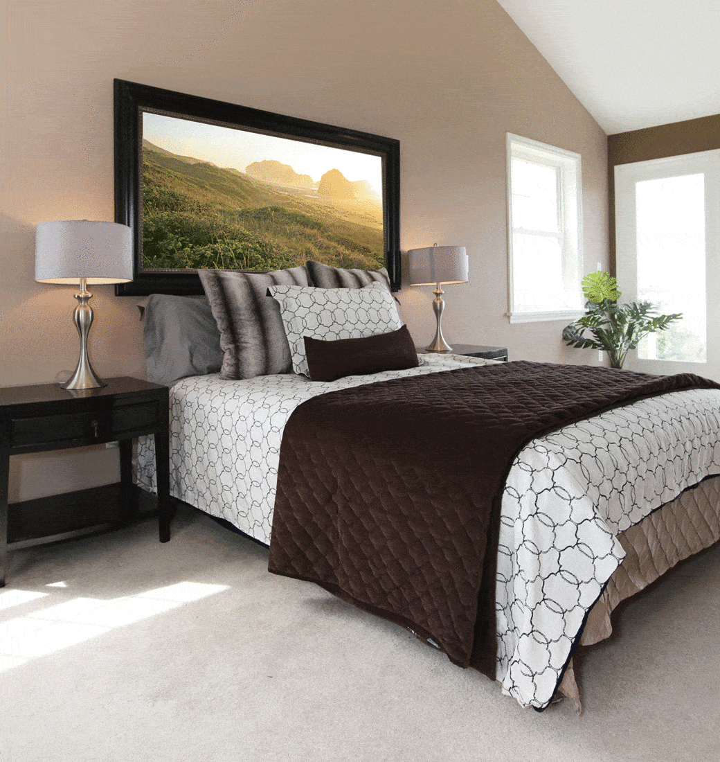Bedroom with modern white and brown bed and nightstands