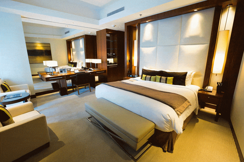 Classy hotel themed large master bedroom