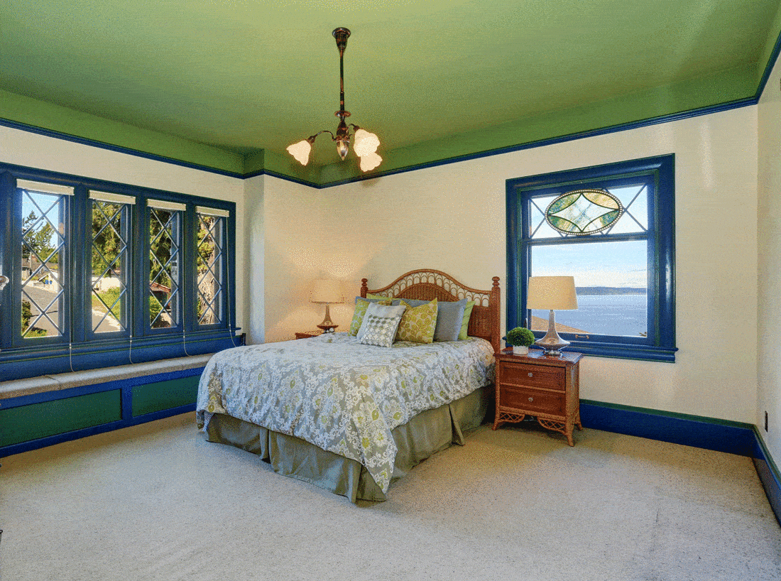 Colorful bedroom with green and blue interior design