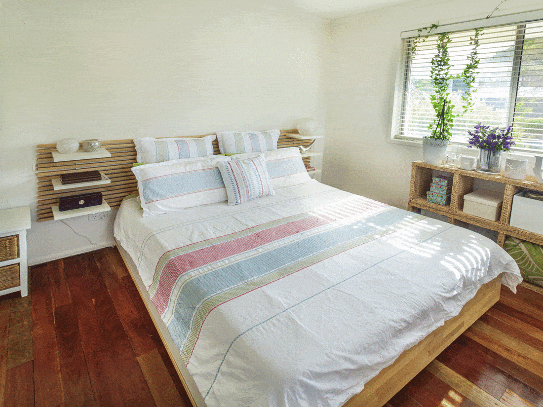 Simple bedroom with wood flooring
