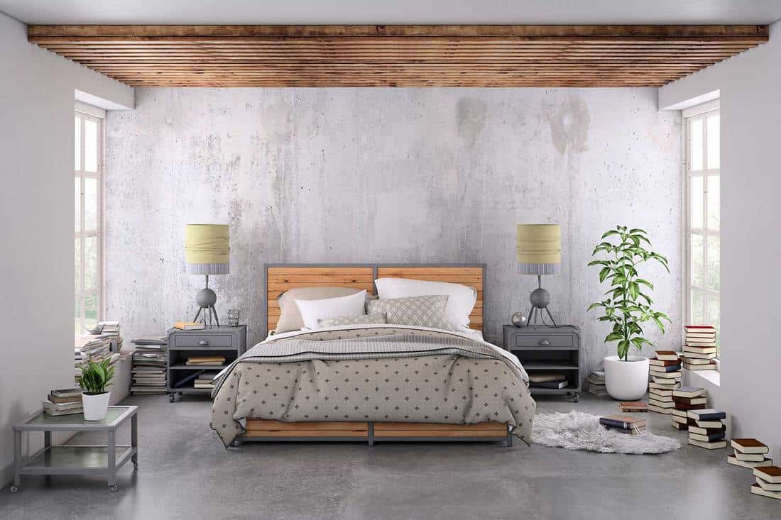 Grey themed bedroom with lots of books