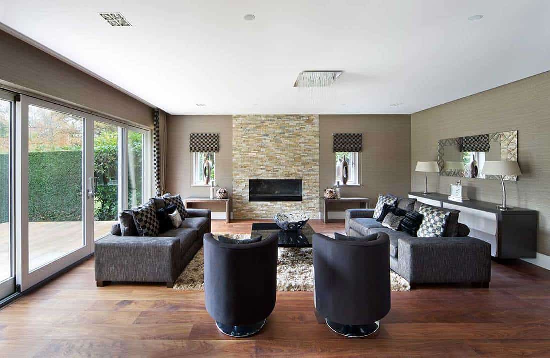 Modern garden lounge with brick electric fireplace
