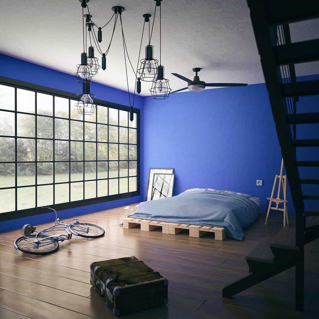 Tidy loft apartment with cool blue walls