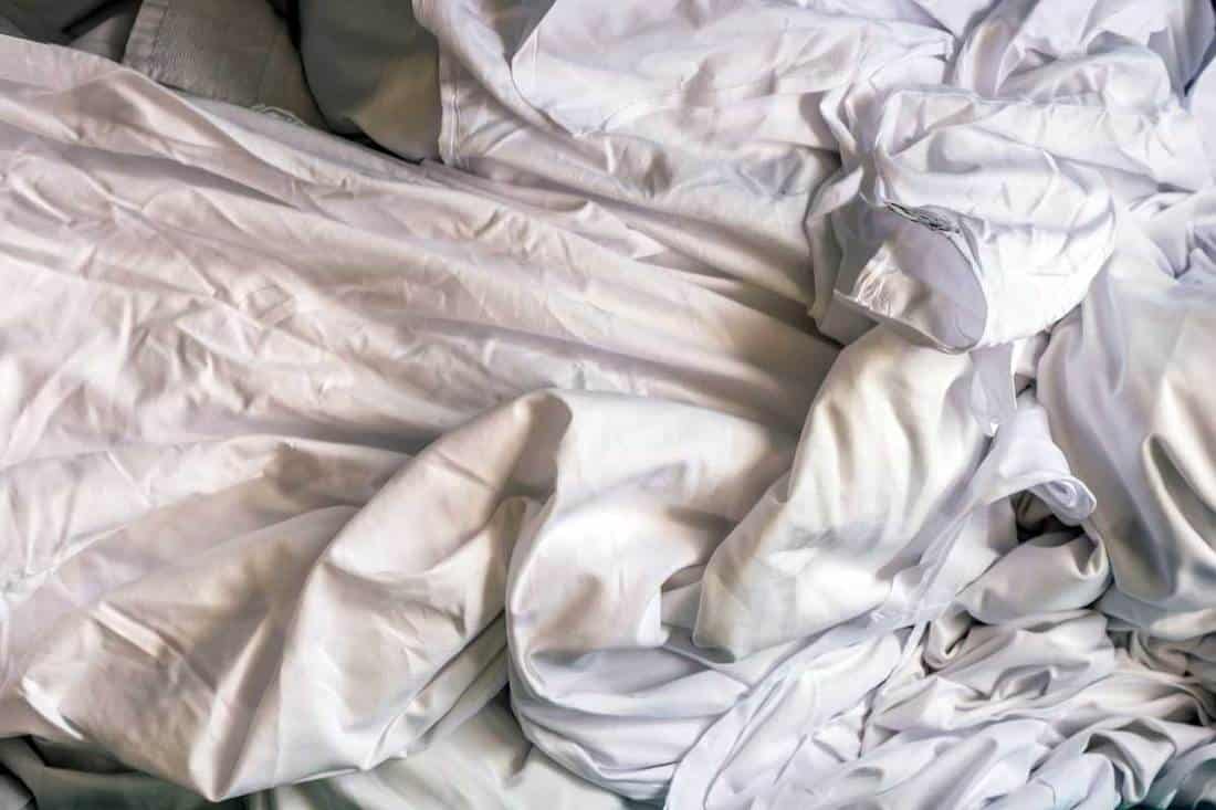 Messy bed sheets with yellow stain, Why Do My Bed Sheets Turn Yellow?