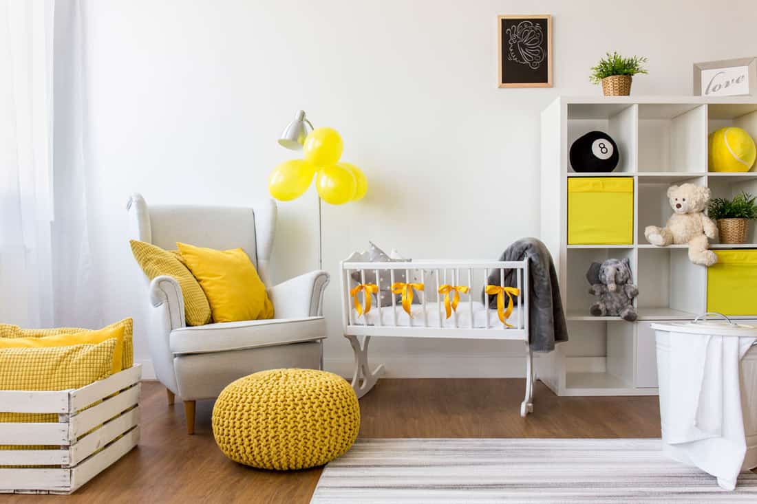 A cute yellow pouf in the nursery room, Can You Sit on a Pouf? [and Is That Even Comfortable?]