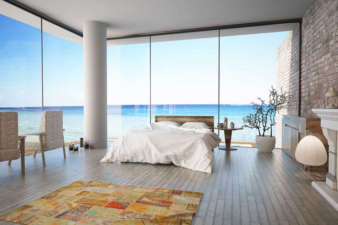 Luxury beach house bedroom with parquet flooring