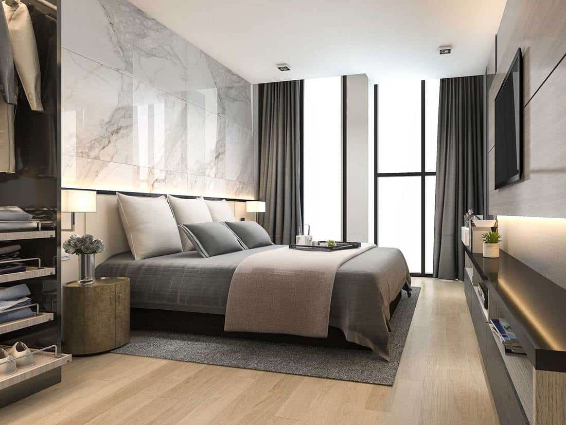 Luxury modern bedroom with parquet flooring and ceramic wall design