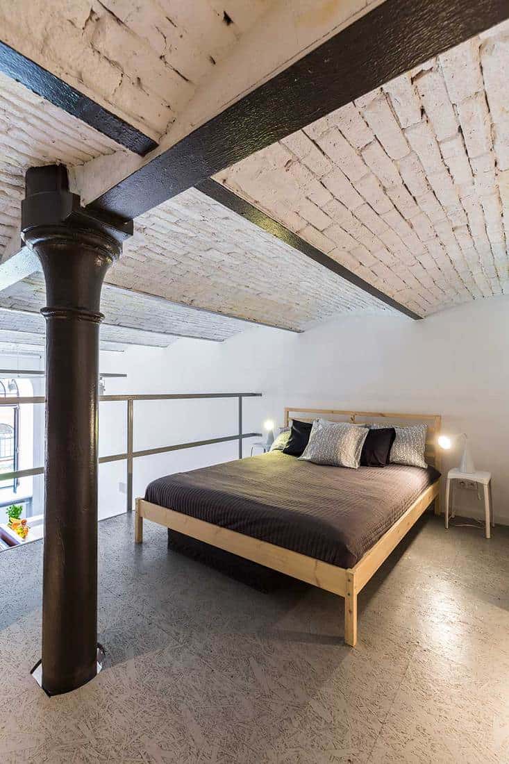 Mezzanine bedroom in industrial style