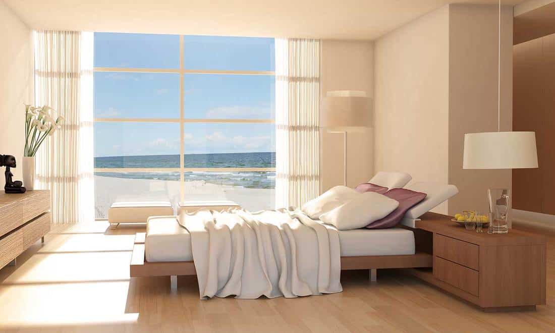 Minimalist bedroom interior with sea view