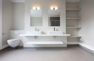 Double sink washroom with a white marble countertopsink washroom