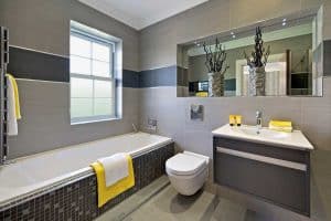 Read more about the article 17 Gorgeous Yellow Bathroom Ideas [And How To Implement Them]