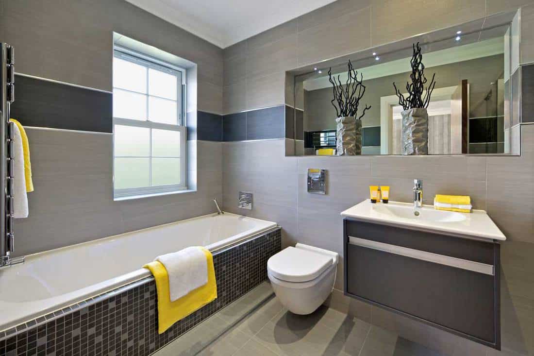 17 Gorgeous Yellow Bathroom Ideas [And How To Implement Them]