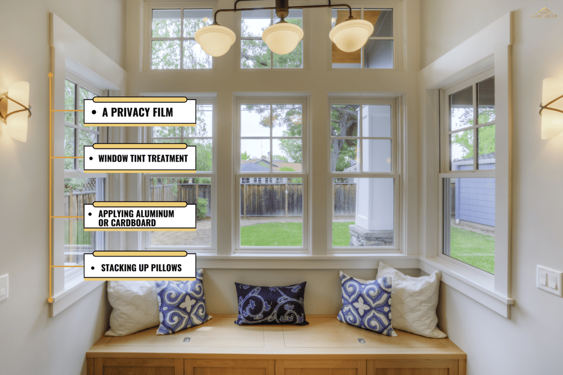 Window Seat with a view to the yard and large windows. - How To Block Light From Windows Without Curtains