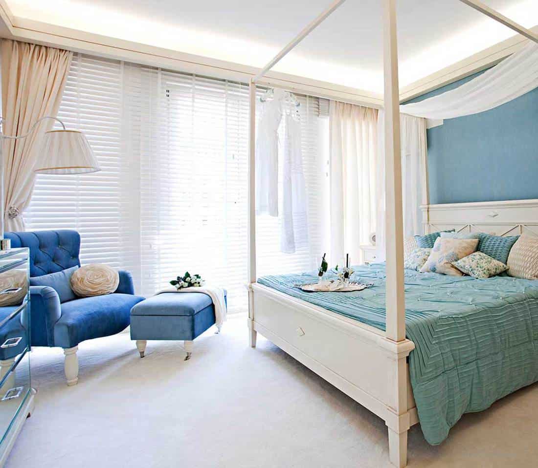 Canopy bed in a modern house bedroom