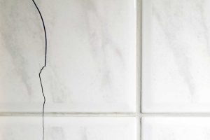Read more about the article Why Do Bathroom Tiles Crack? (And How To Fix That)