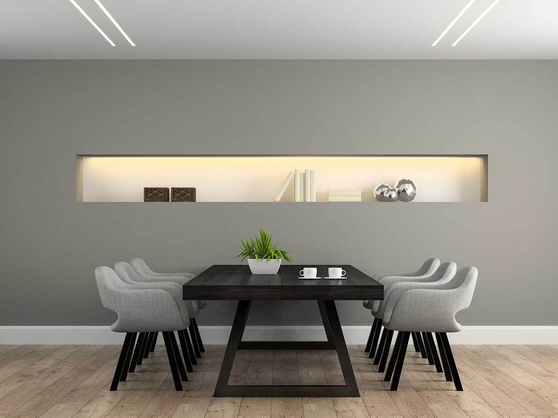 Modern dining room interior with hardwood floor and coffee cups on the table