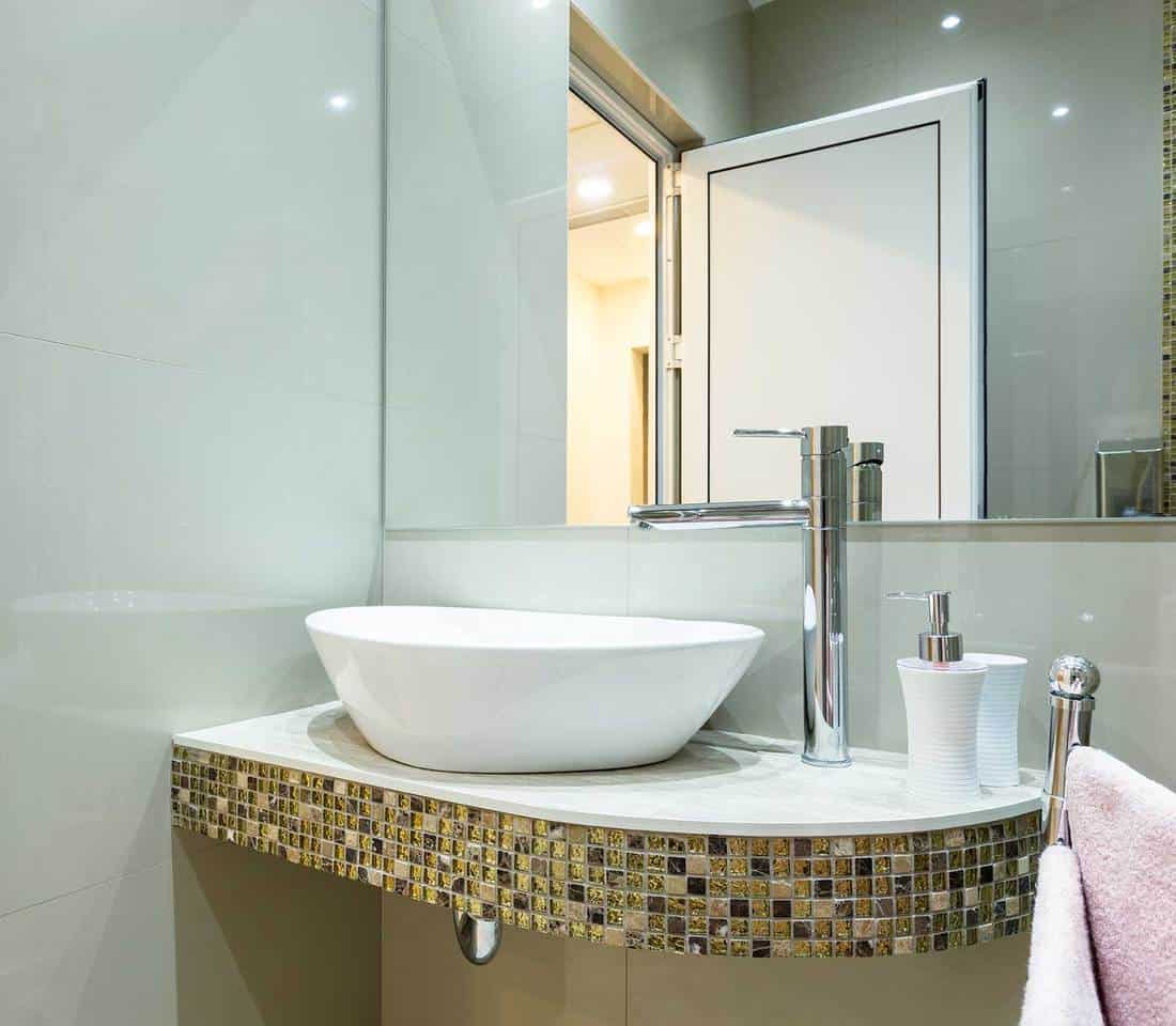 Modern hotel wash basin with mosaic design countertop