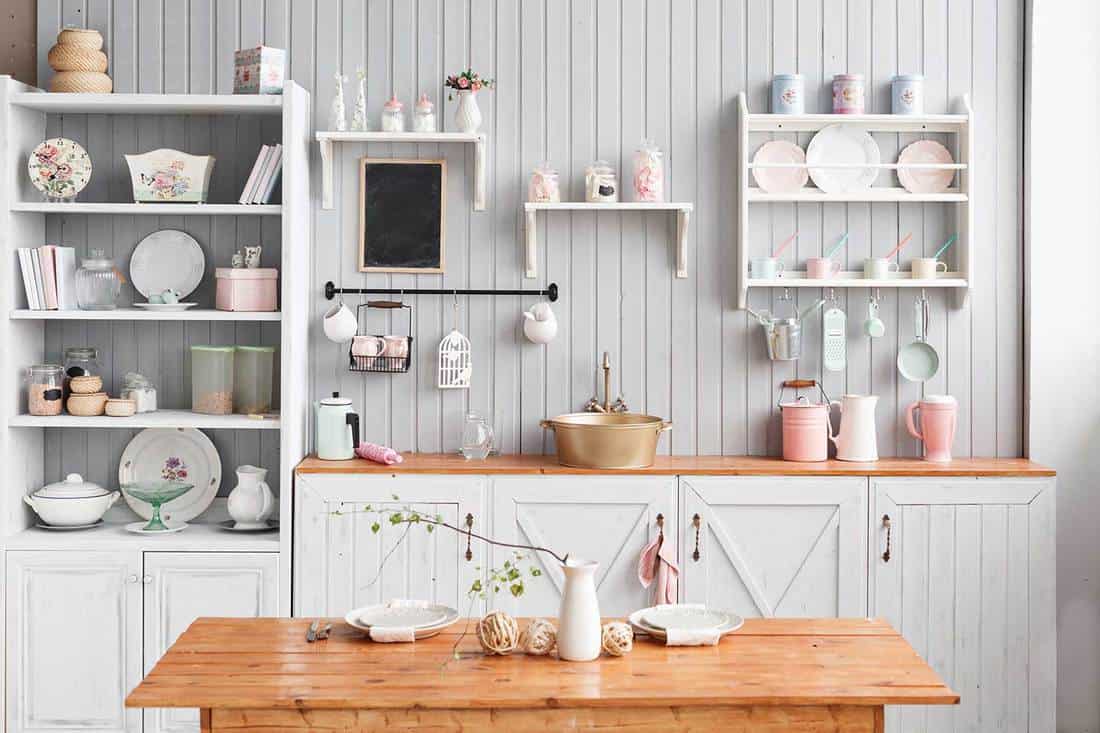 Beautiful wooden house kitchen interior enamelware and kitchen utensils