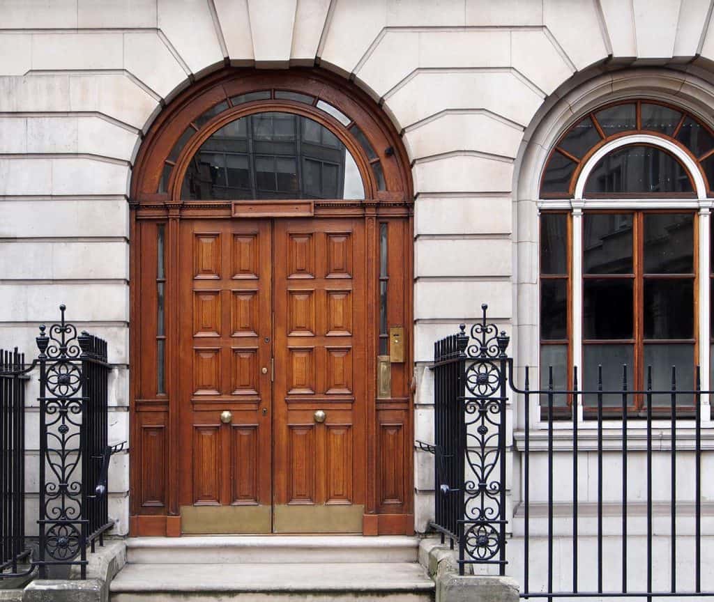 Elegant front door of an expensive townhouse in London
