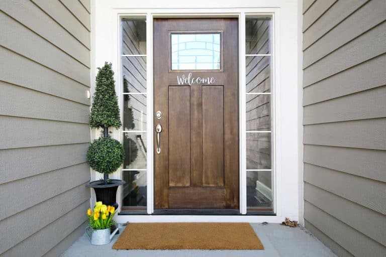 Front wood door with plants, 21 Cool Front Door Decor Ideas