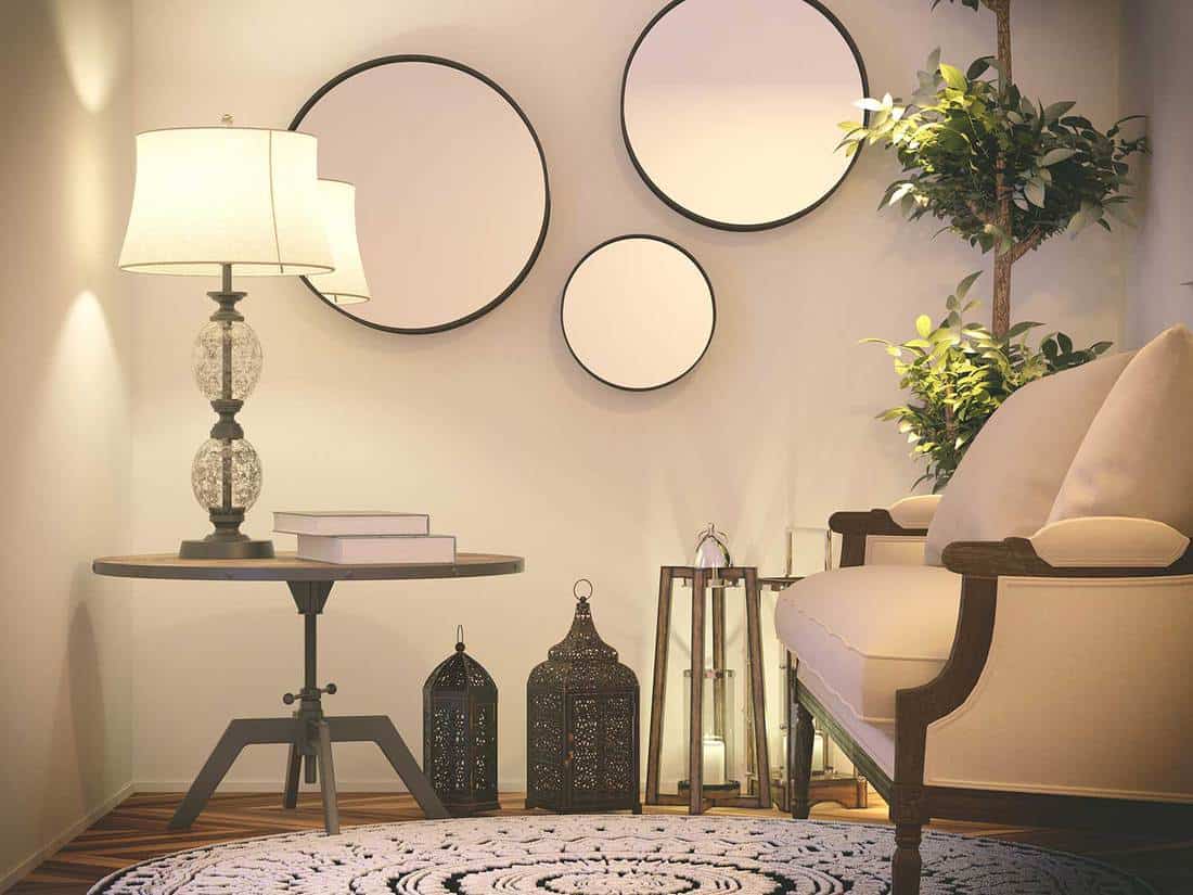 Modern living room with vintage interior and 3 round mirrors