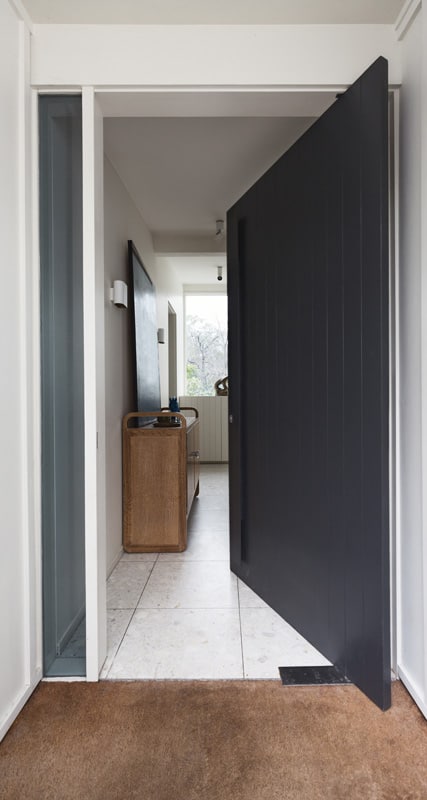 Open front pivot style door to a luxury Australian home