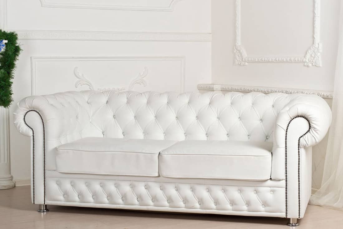 White sofa with intricate and sophisticated design