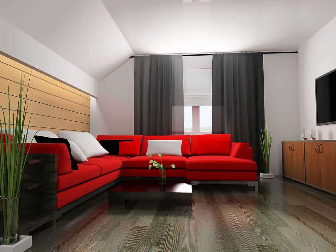 Red corner sofa in modern interior