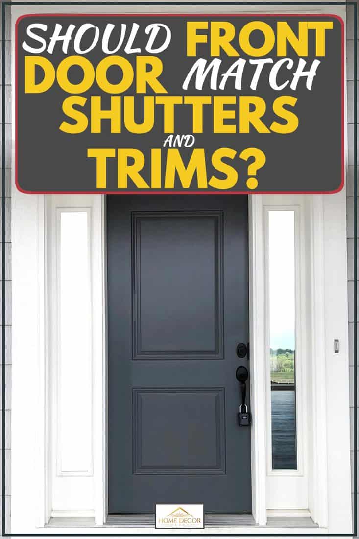 A modern front door with a white framing and a black painted door, Should Front Door Match Shutters and Trims?