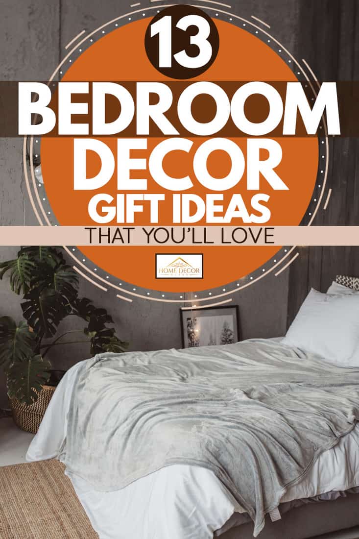 A bedroom with white bedding sets, small Christmas light on the side and a wallpaper pattern on the background, 13 Bedroom Decor Gift Ideas that You'll Love