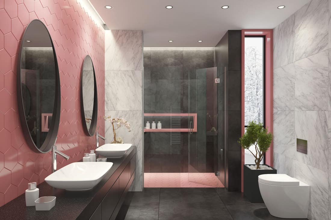 A light pink colored modern bathroom with two huge circular mirror, Gray Tile Bathroom: What Color Should The Wall Be? [Inc. 26 Photos Examples]
