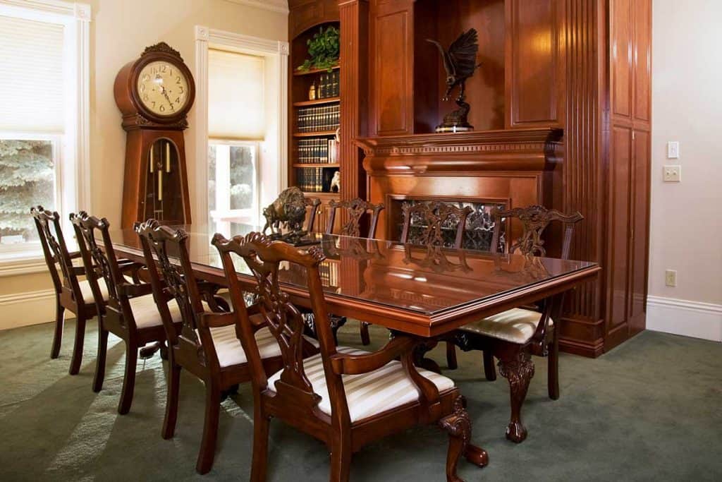 A formal dining room in an antique Victorian style home.