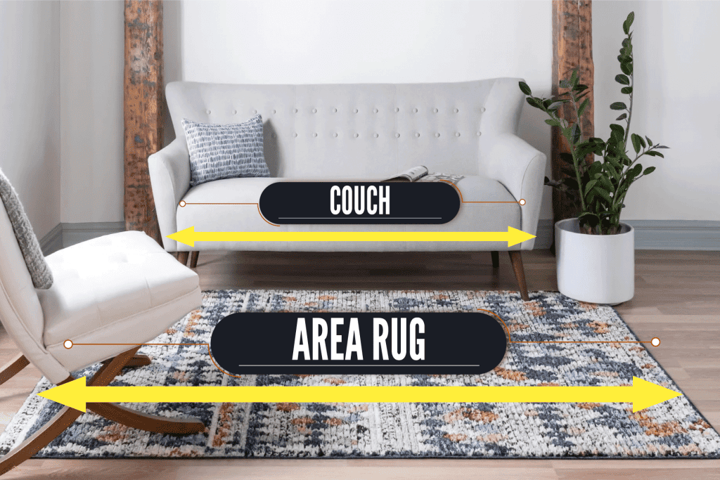 Gray sofa with matching gray throw pillows matching the overall themed of the area rug, Should Area Rug Be Wider Than Couch?