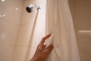 Read more about the article Why Does My Shower Curtain Attack Me? [And How To Prevent That]