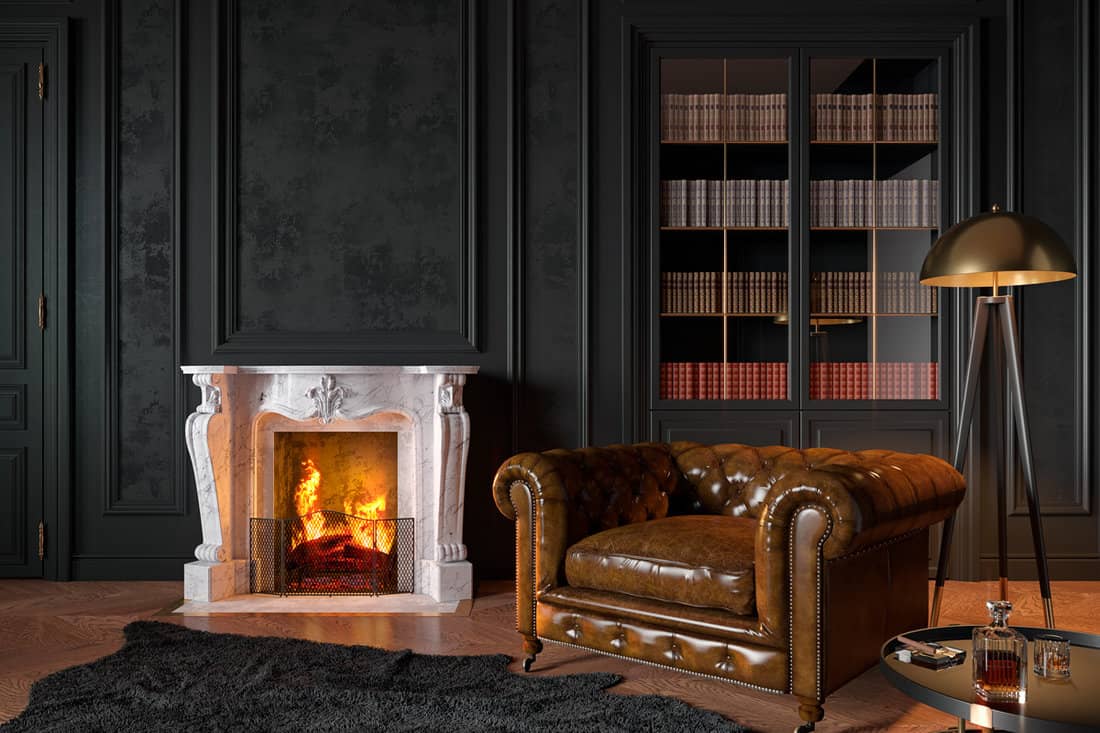 A shinny leather sofa inside a reading room