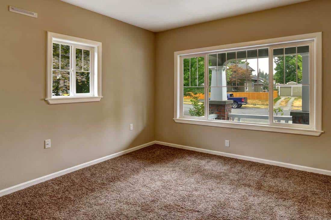 Beige empty room with brown carpet floor, Should Carpet Be Lighter Or Darker Than Walls?