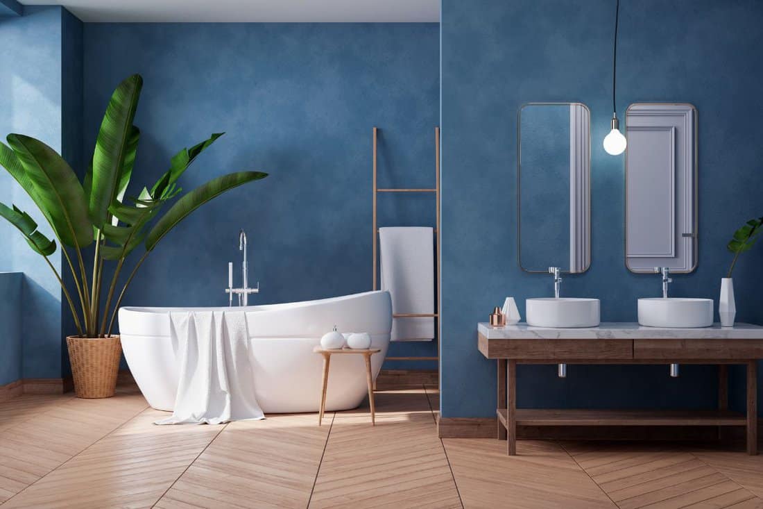 Luxurious Modern Bathroom interior design,white bathtub on grunge dark blue wall,3d render 