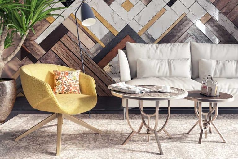 Modern interior with yellow armchair in front of a accent wall stock photo