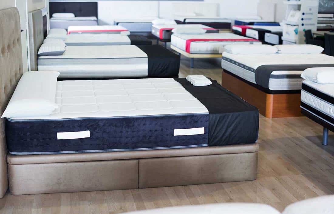 New mattresses on the beds in the store