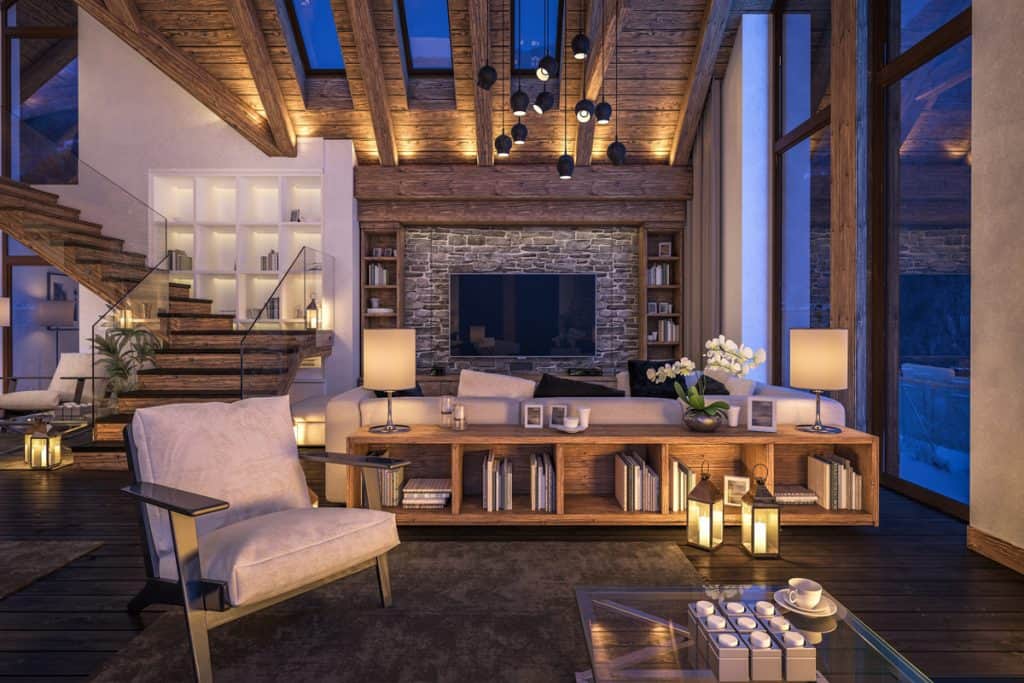 Rustic designed living room installed with wooden panels on the ceiling and on the walls for the cabinet