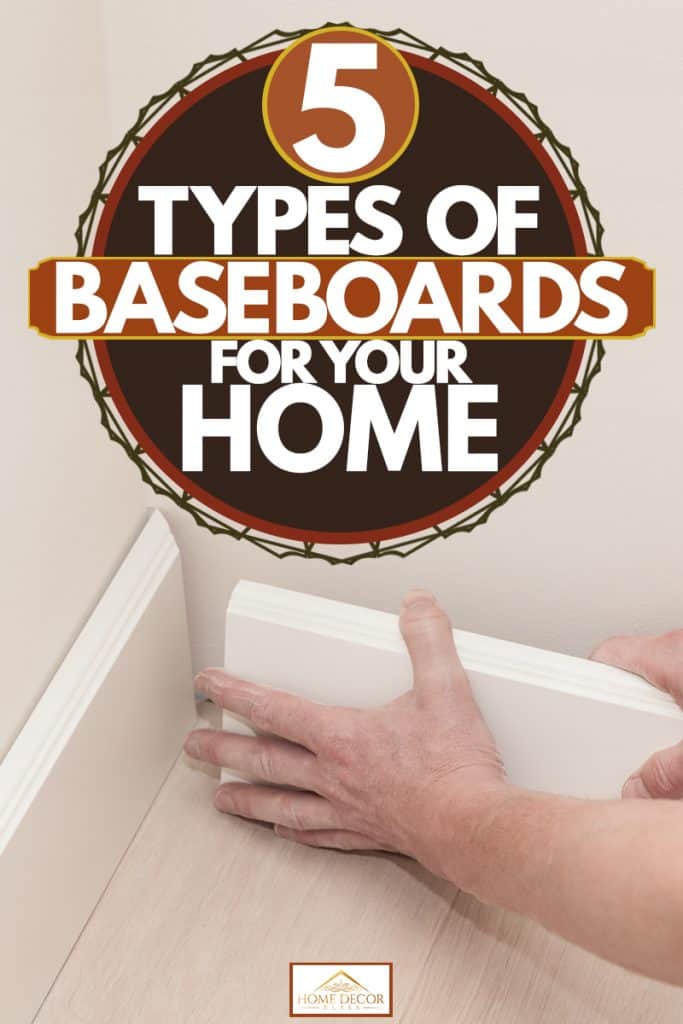 A man holding a white colored baseboard and placing it to find the angle for the 45 degree cut, 5 Types Of Baseboards For Your Home