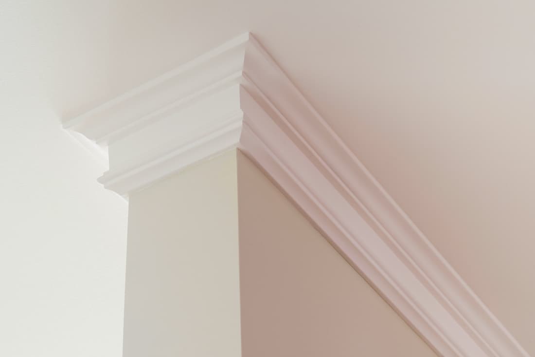 A white crown molding inside a living room, What Crown Molding to Choose? [Various Types Assessed]
