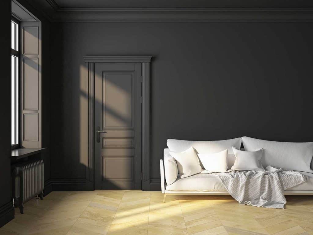Design d'intérieur scandinave classique noir avec canapé et oreillers