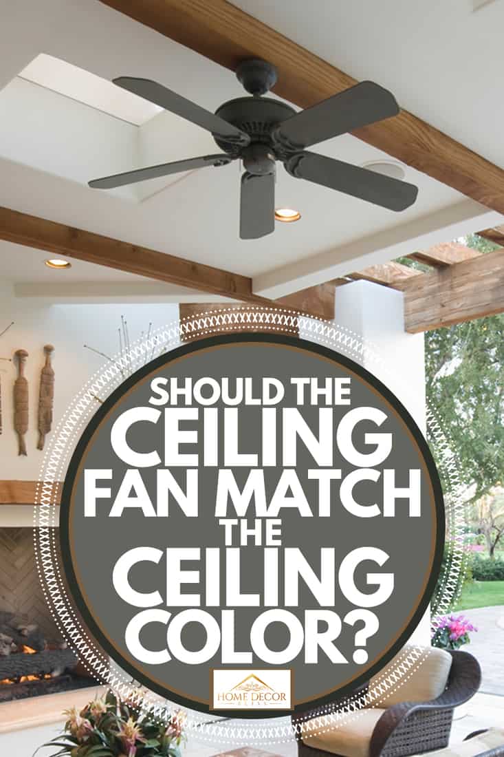 A tropical house with an outdoor pool, rattan chairs, a white painted ceiling with a black colored ceiling fan, Should the Ceiling Fan Match the Ceiling Color?