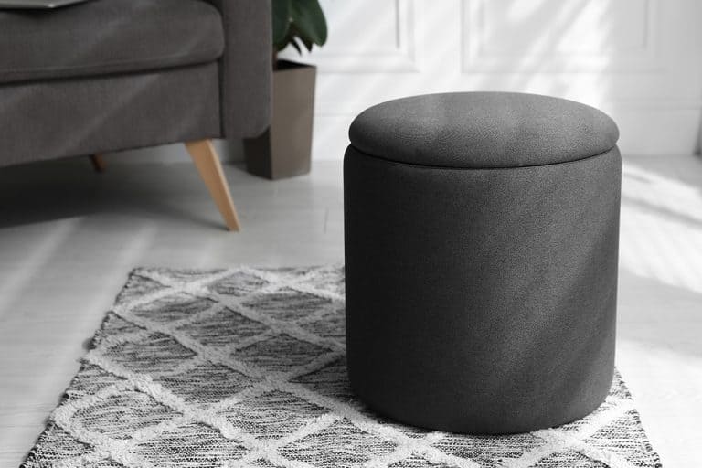 Stylish comfortable ottoman in room, What Is The Best Height For An Ottoman? [By Function]