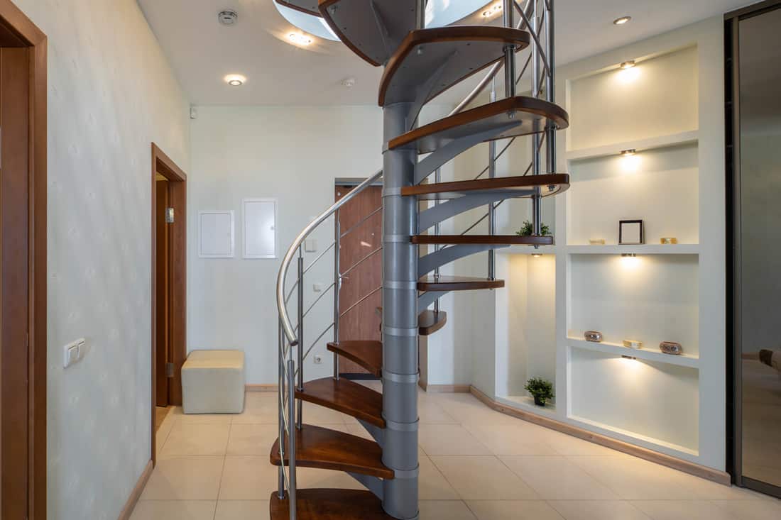 A steel and wooden step winding staircase, Should Staircase Be Clockwise Or Anticlockwise?